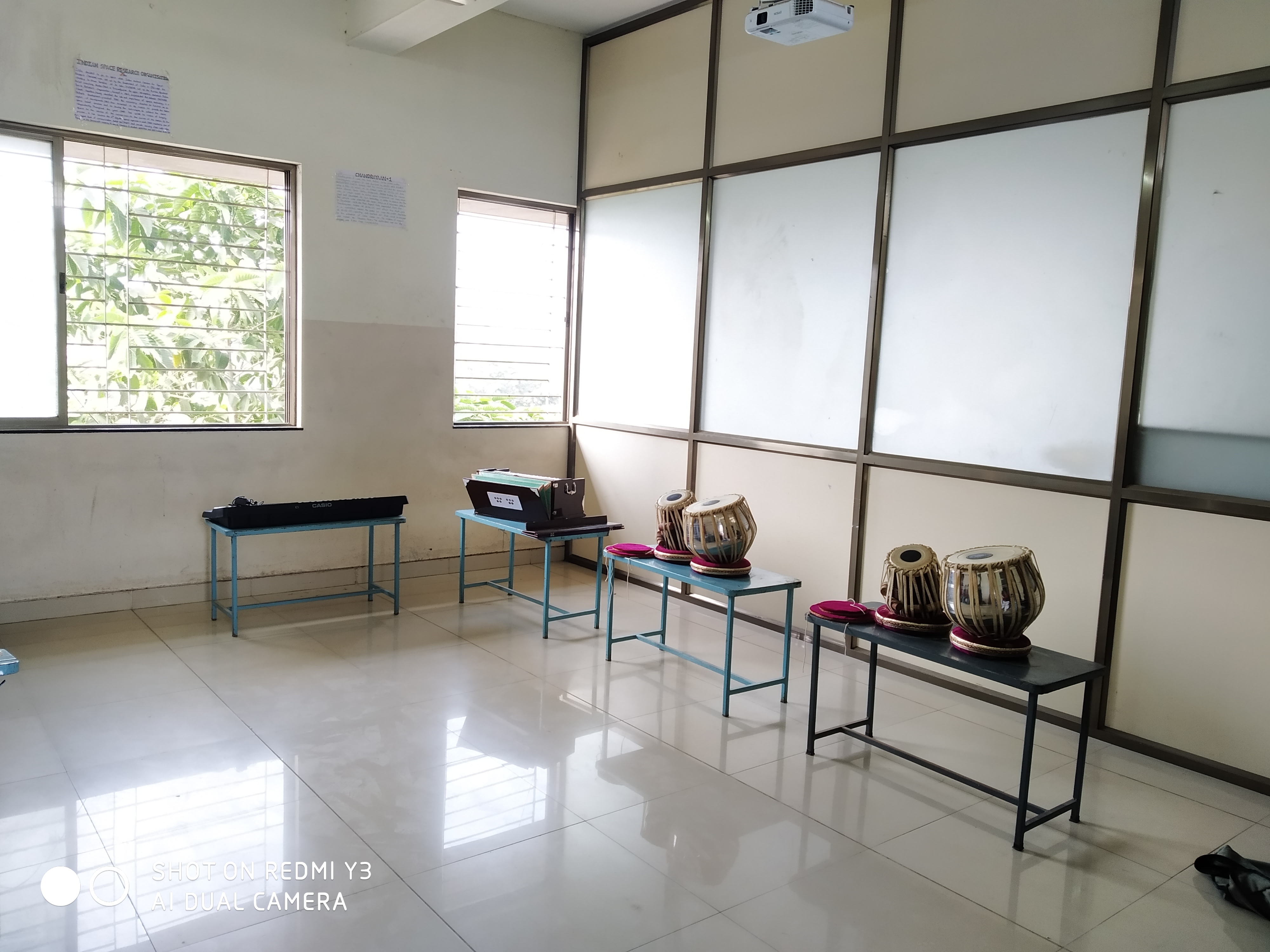 A music room with various musical instruments
